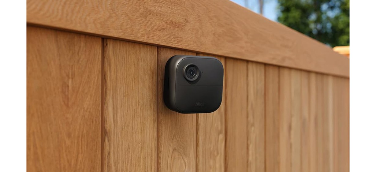 Blink Outdoor 4 (4th Gen) on wooden fence Blink Outdoor 4 (4th Gen) on wooden fence