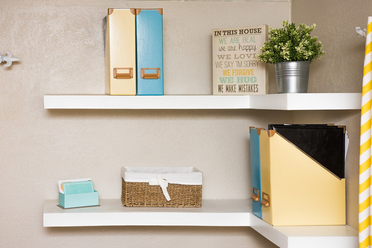 corner shelf with items on top