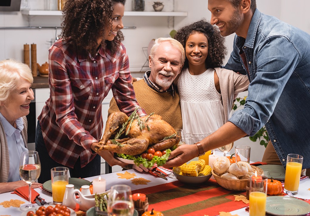 Thanksgiving family dinner with decor on table