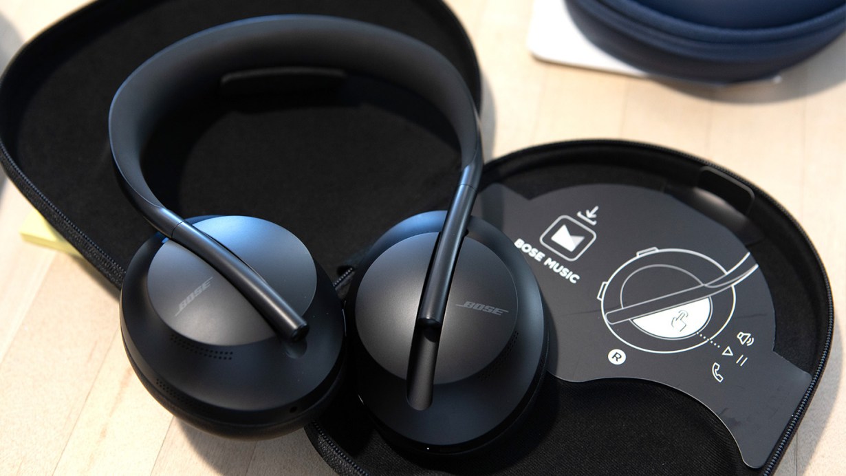 Bose QuietComfort Ultra Headphones in case on table