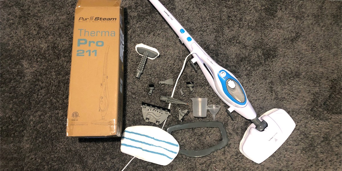 PurSteam 10-in-1 Steam Mop and accessories next to product box