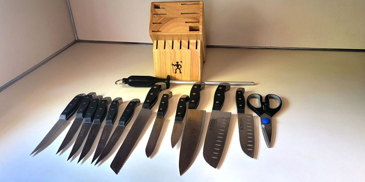 Henckels Premium Quality 15-Piece Knife Set knives and accessories displayed on counter Henckels Premium Quality 15-Piece Knife Set knives and accessories displayed on counter