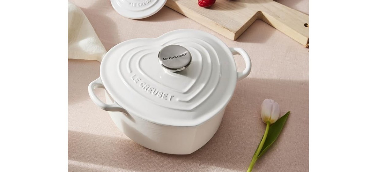 White Le Creuset Signature Enameled Cast Iron Figural Heart Cocotte on table