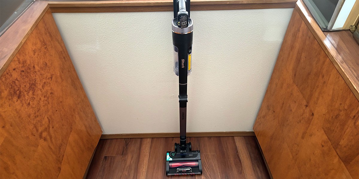 Shark Stratos Cordless Vacuum leaning against wall