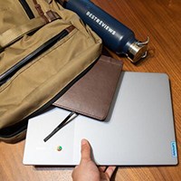 Placing Chromebook laptop computer into backpack