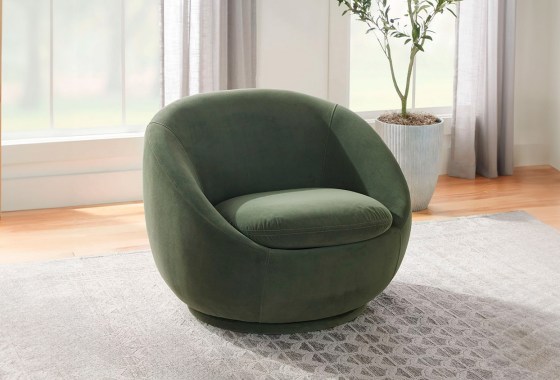 Walmart's $250 version of West Elm's popular velvet swivel chair is just as chic