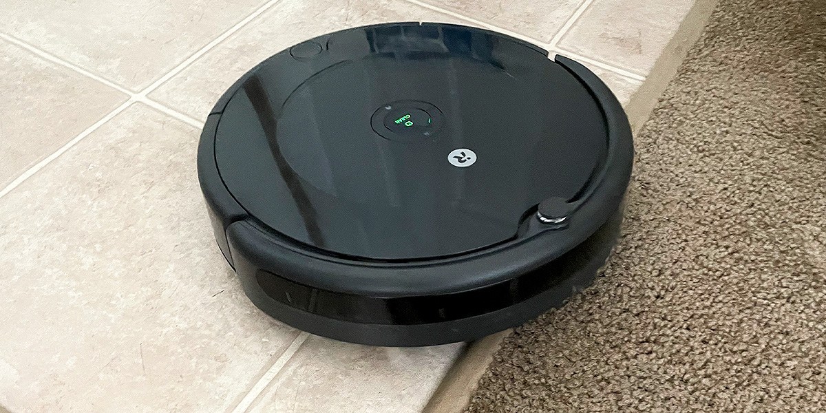 Roomba 694 hard floor navigating toward carpeted area