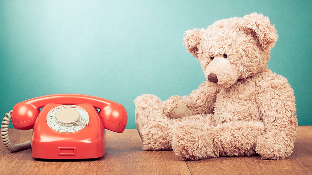 Toy telephone and toy bear