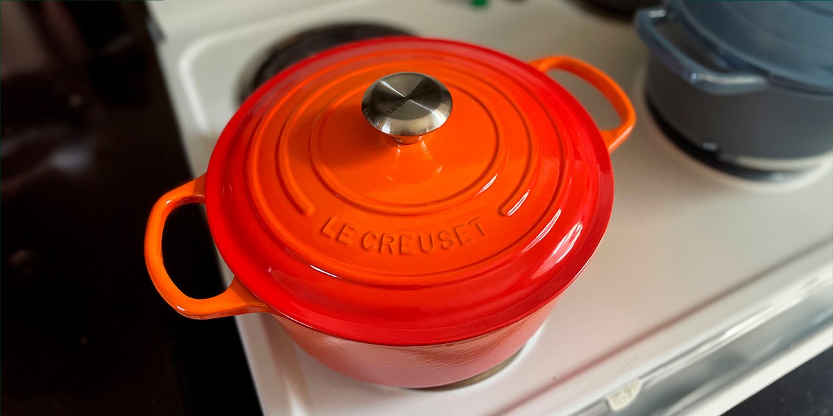 Le Creuset Signature Round Dutch Oven on stove burner
