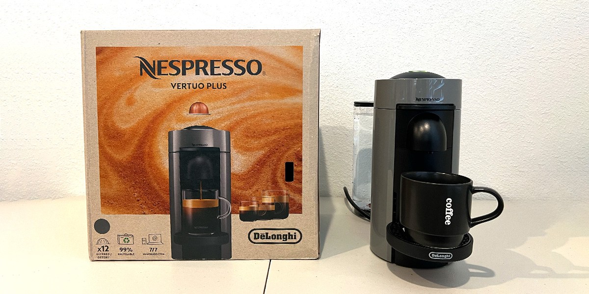 Nespresso VertuoPlus Coffee and Espresso Machine on counter next to product packaging