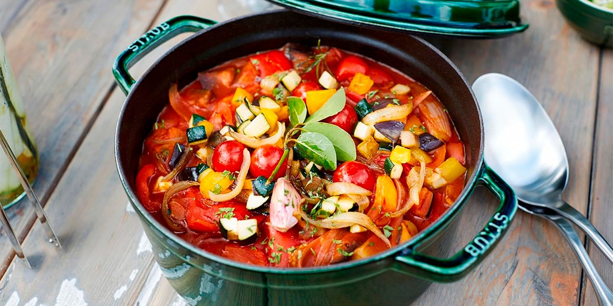 Green Staub Cast Iron Dutch Oven with stew inside